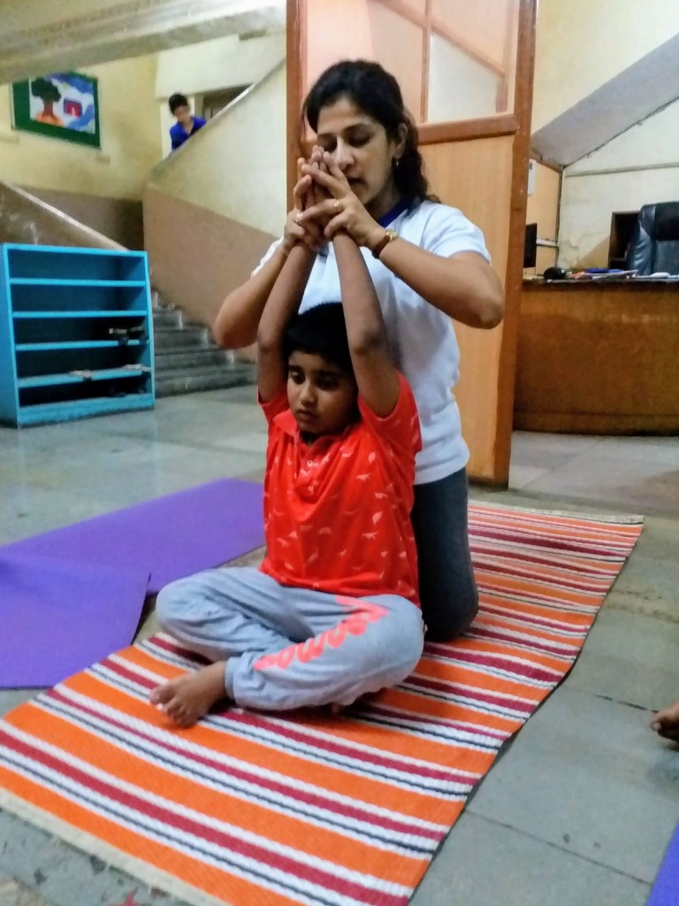 Guided yoga stretching session with physical therapist